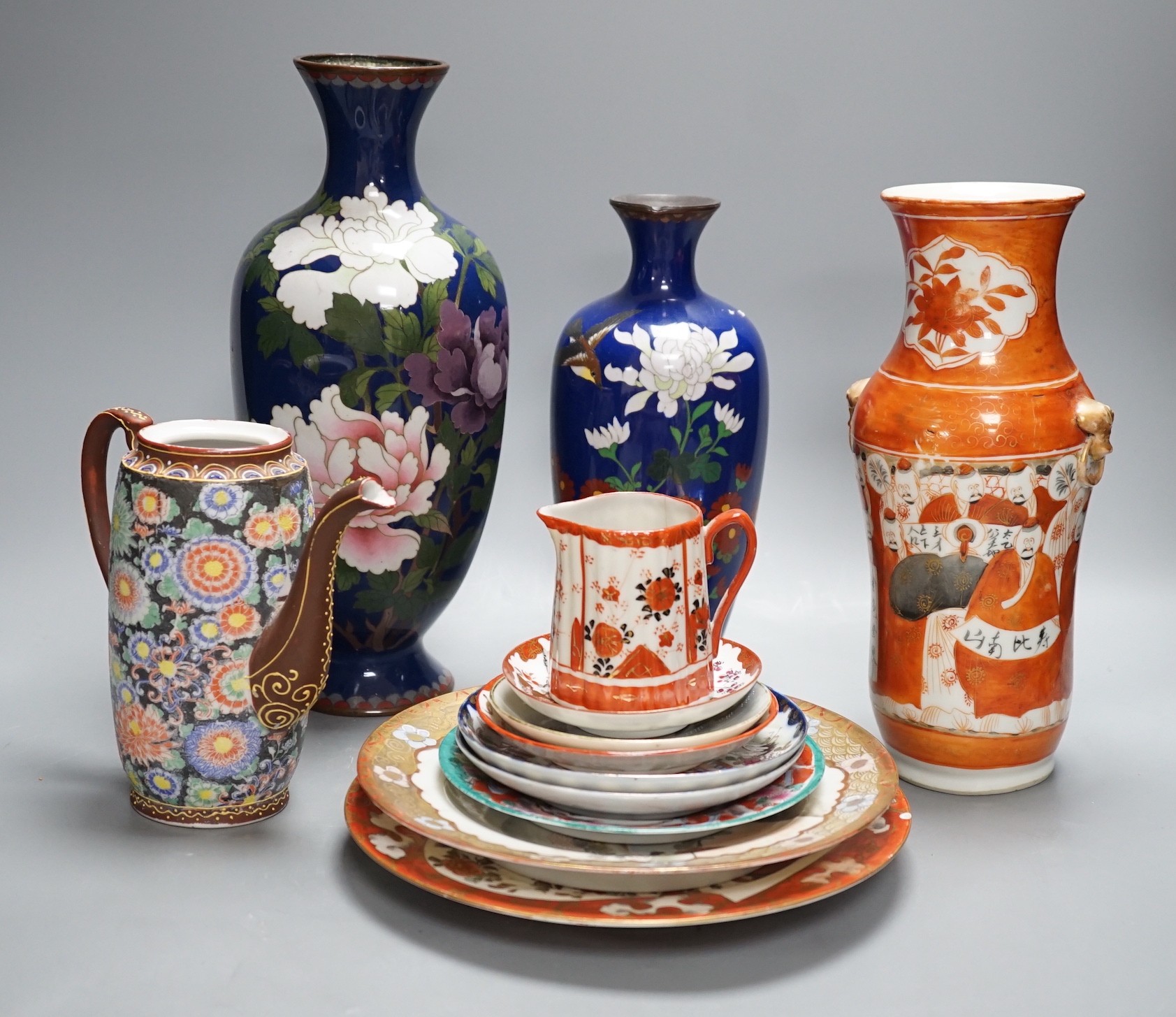 A mixed group of Japanese cloisonné enamel vases and porcelain vases and plates